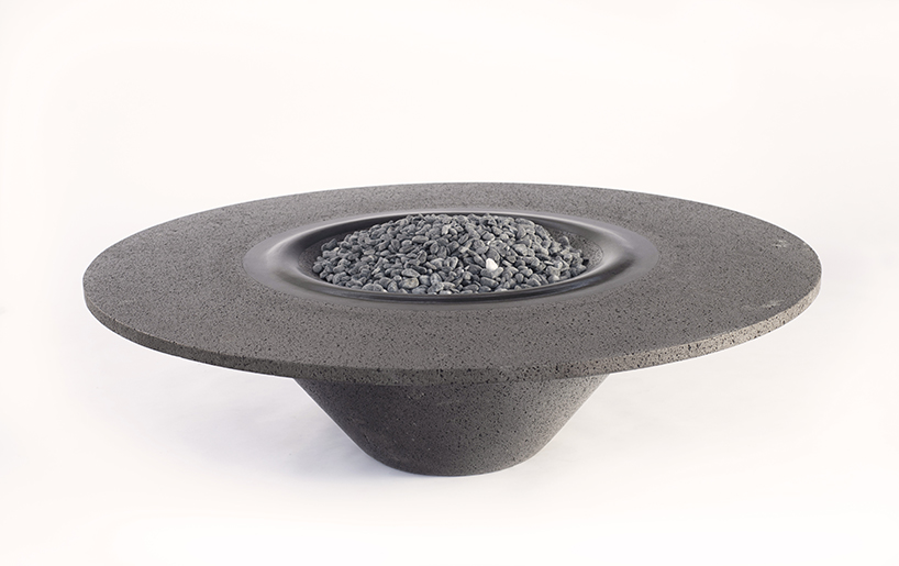 peca studio introduces 'umo rocka' sculptural fire pit made out of volcanic rock