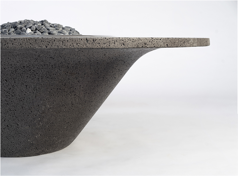 peca studio introduces 'umo rocka' sculptural fire pit made out of volcanic rock