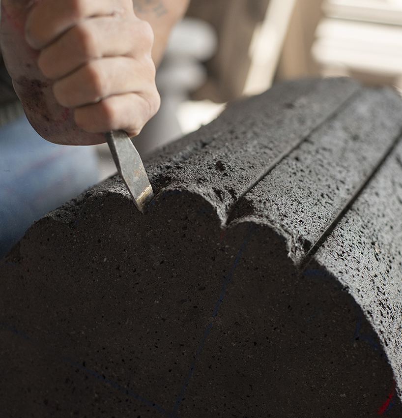 peca studio carves tables from volcanic rock for 'loto roca' collection designboom