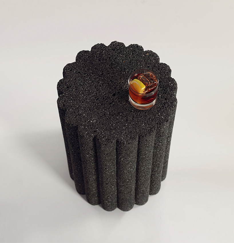 peca studio carves tables from volcanic rock for 'loto roca' collection designboom