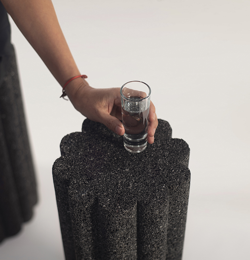 peca studio carves tables from volcanic rock for 'loto roca' collection designboom