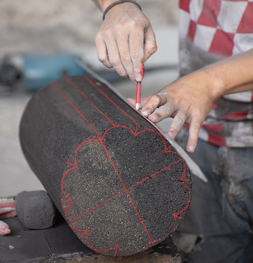 peca studio carves tables from volcanic rock for 'loto roca' collection designboom