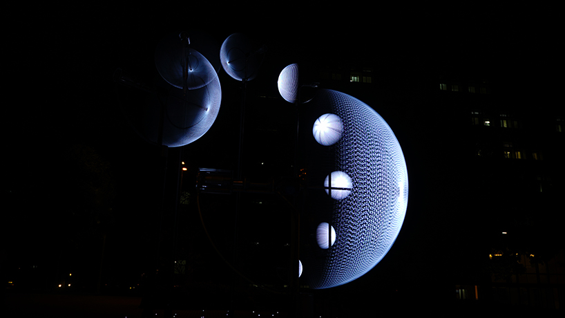 whyixd creates 9 rotating light installations in taiwan inspired by the moon's rotations