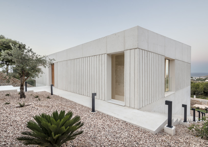 NOMO STUDIO designs a house to frame the views of menorca designboom