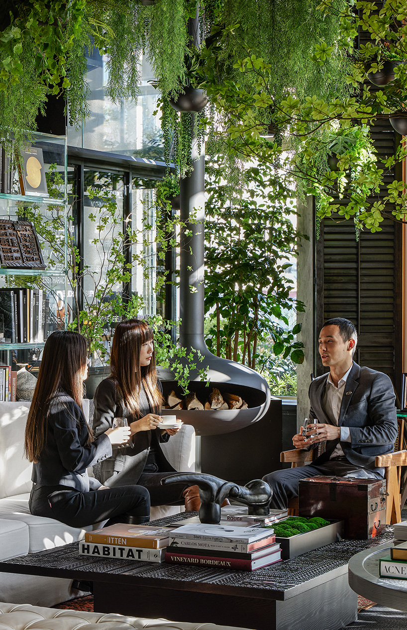 industrial materials, lush greenery and dramatic paintings complete new CCD shanghai headquarters
