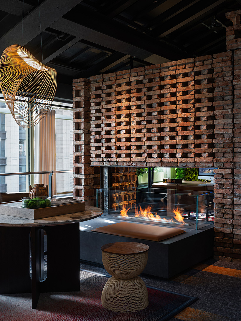 industrial materials, lush greenery and dramatic paintings complete new CCD shanghai headquarters