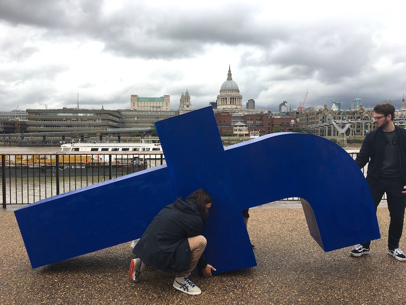 filipe vilas-boas carries the cross of social media around london's tate modern designboom