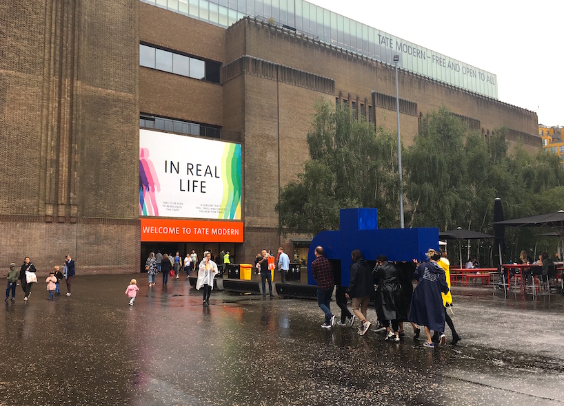 filipe vilas-boas carries the cross of social media around london's tate modern designboom