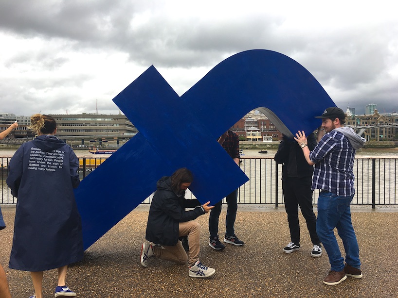 filipe vilas-boas carries the cross of social media around london's tate modern designboom