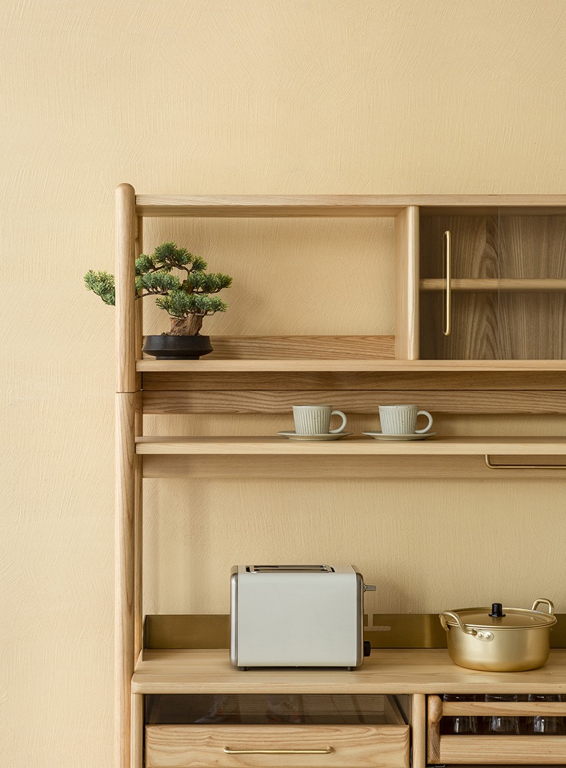 yen-hao, chu combines clean lines and solid wood to design the muzhi cupboard designboom