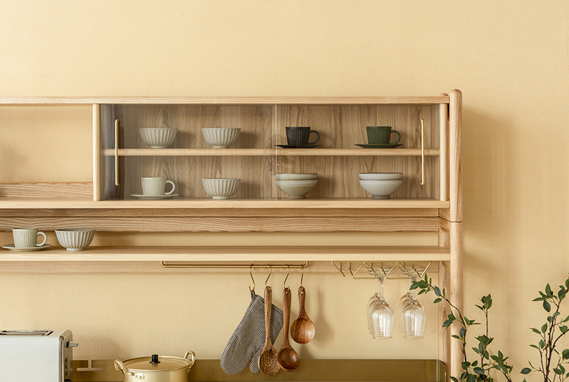 yen-hao, chu combines clean lines and solid wood to design the muzhi cupboard designboom