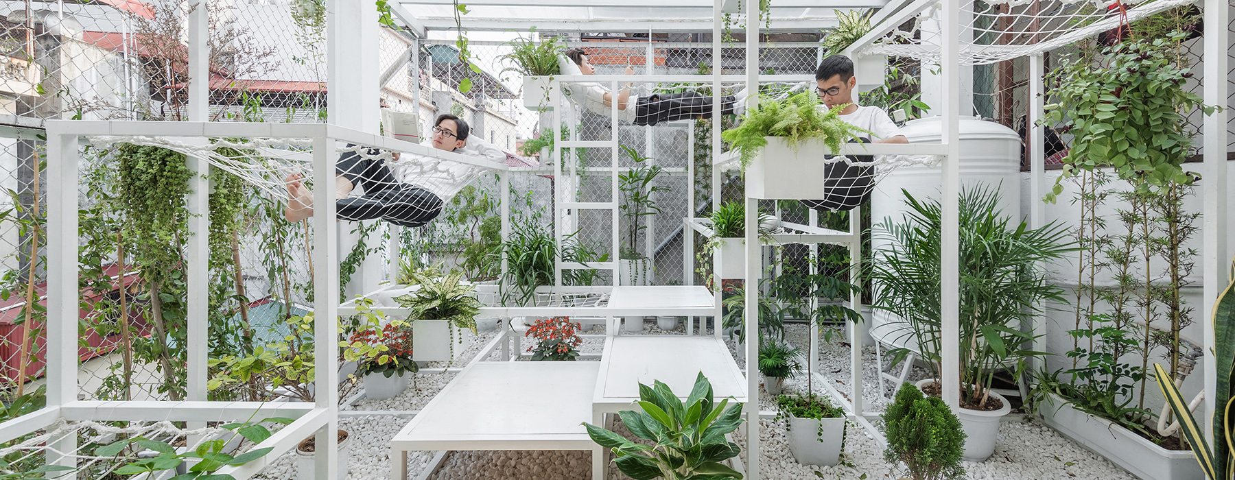 hung nguyen's eco-friendly pavilion in hanoi is adorned with air purifying plants