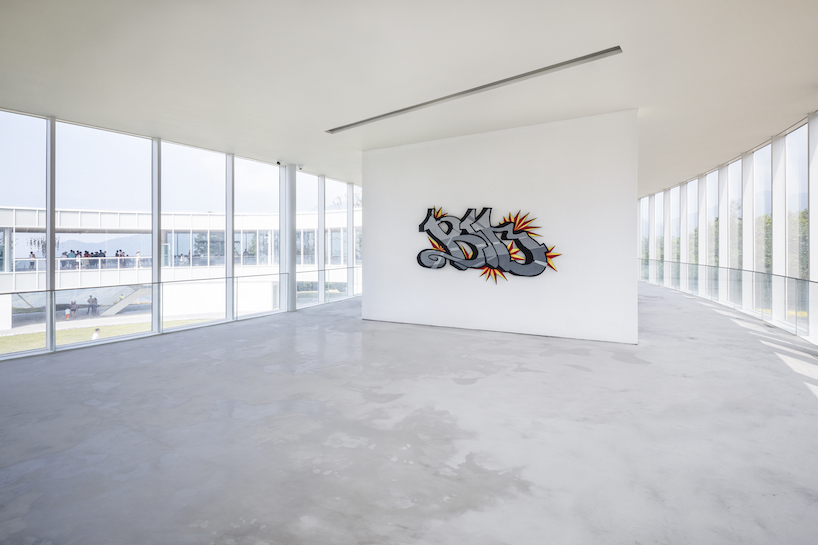 C+ architects builds an elliptical ring on the mountainside for LAB art museum in china designboom