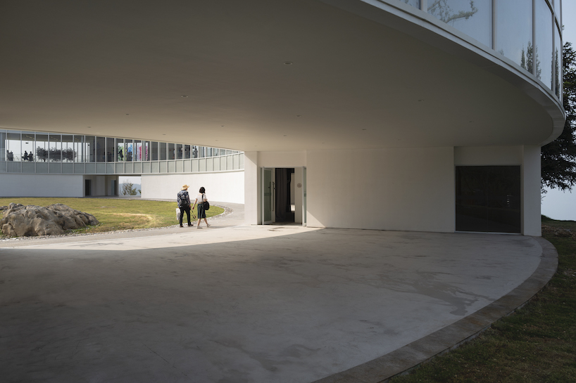 C+ architects builds an elliptical ring on the mountainside for LAB art museum in china designboom