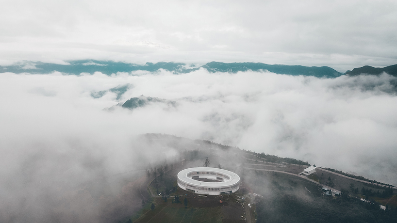C+ architects builds an elliptical ring on the mountainside for LAB art museum in china designboom