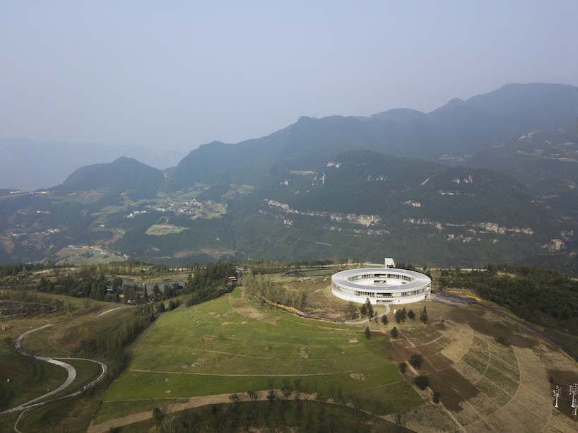 C+ architects builds an elliptical ring on the mountainside for LAB art museum in china designboom