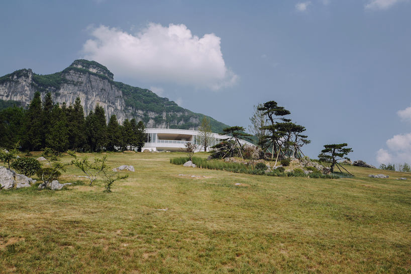 C+ architects builds an elliptical ring on the mountainside for LAB art museum in china designboom