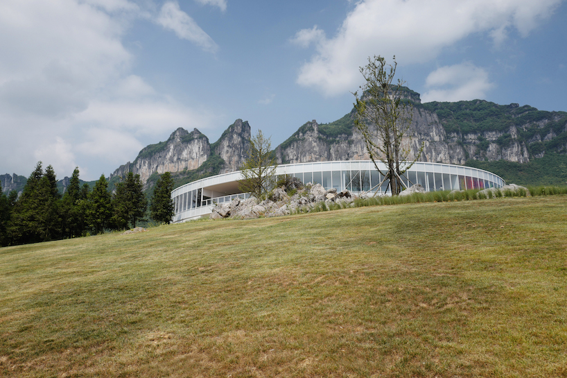 C+ architects builds an elliptical ring on the mountainside for LAB art museum in china designboom