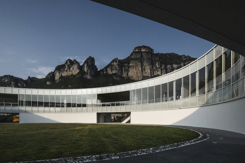 C+ architects builds an elliptical ring on the mountainside for LAB art museum in china designboom