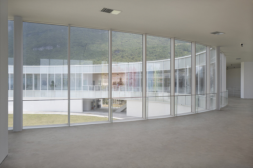 C+ architects builds an elliptical ring on the mountainside for LAB art museum in china designboom