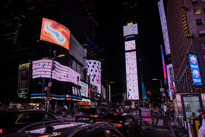 leaping olympic gymnasts form shifting colorfield in yuge zhou's NYC times square takeover