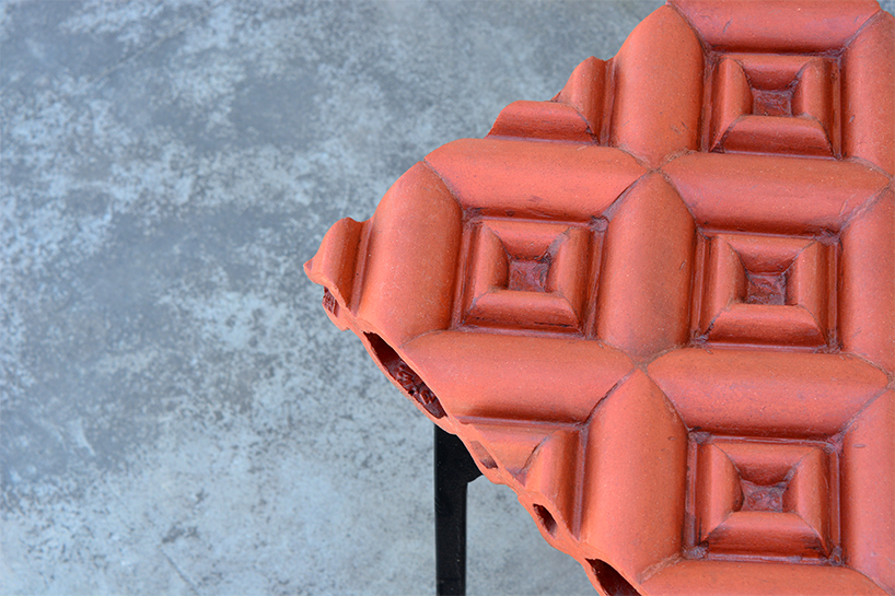 manoj patel repurposes clay roof tiles with sculptural outdoor furniture series