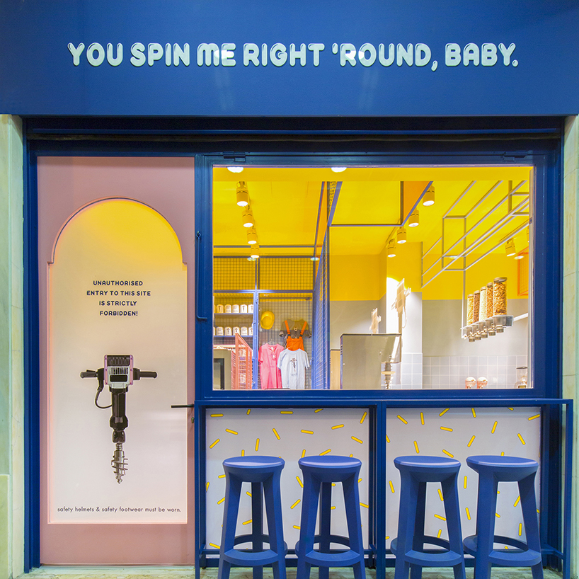 bright color contrasts + graphic lettering realize ice cream store by studiomateriality in greece