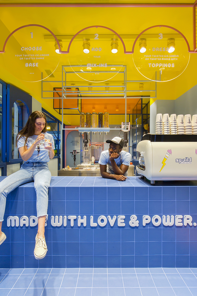 spoild bright color contrasts + graphic lettering realize ice cream store by studiomateriality in greece