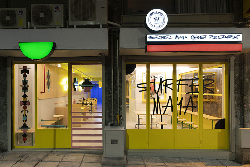 graffiti fonts and neon signs characterize studiomateriality's 'surfer maya' restaurant in greece