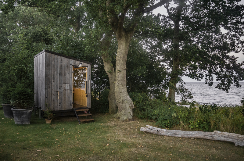 native narrative designs premium oak clad mobile sauna on the danish coast for scandinavian sauna 3