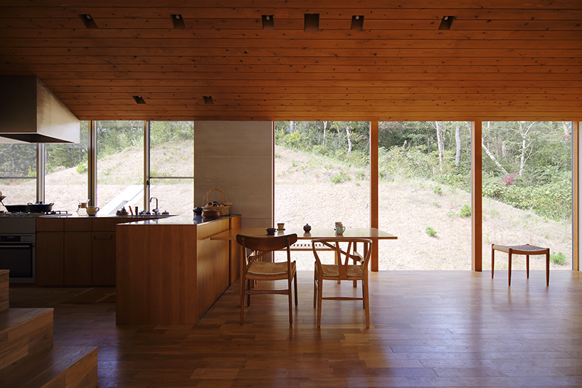 fujiwaramuro architects' triangular house in kobe sits atop hilly japanese terrain - 2