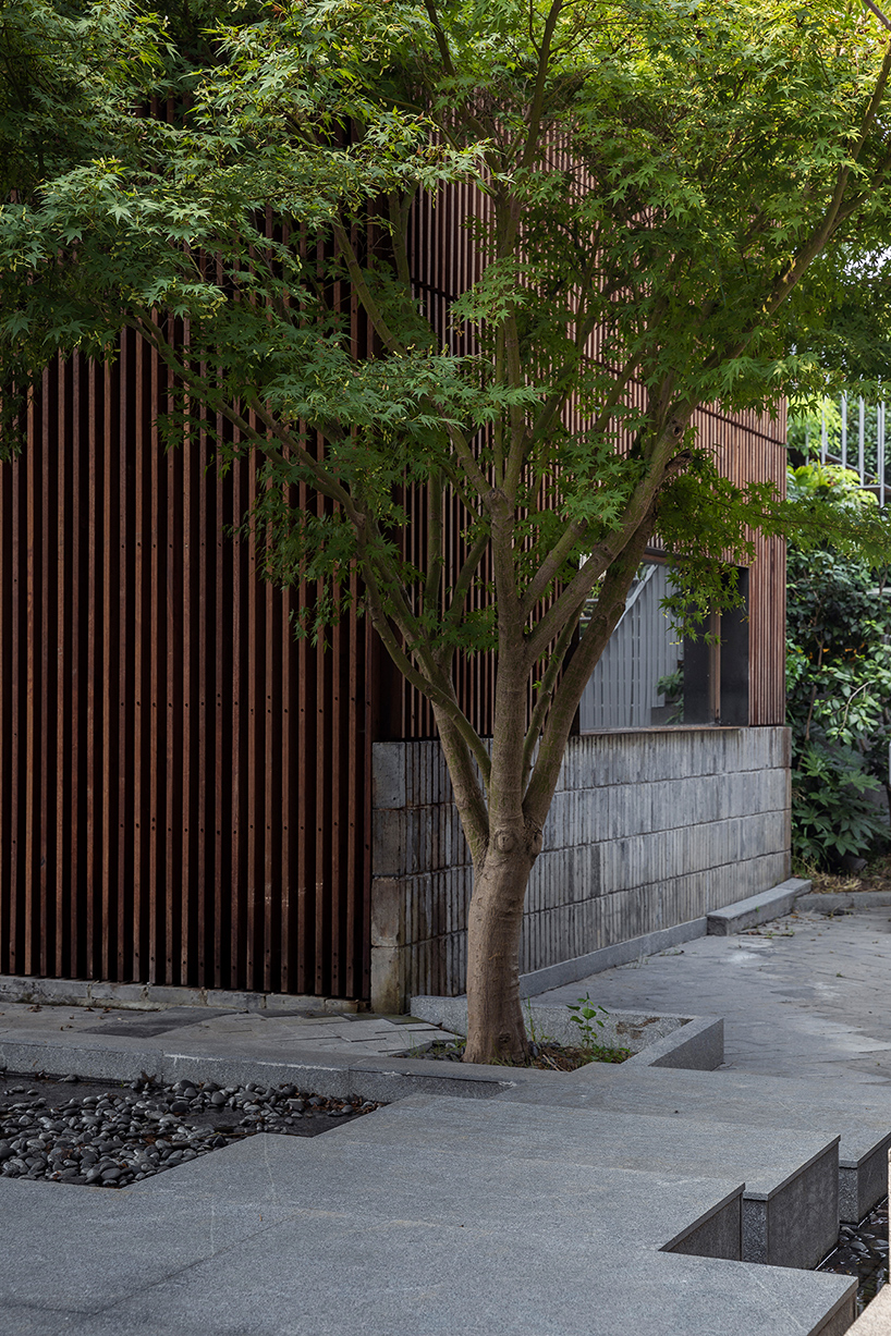 TEMP combines timber and granite to design ajia teahouse in a chinese national park designboom