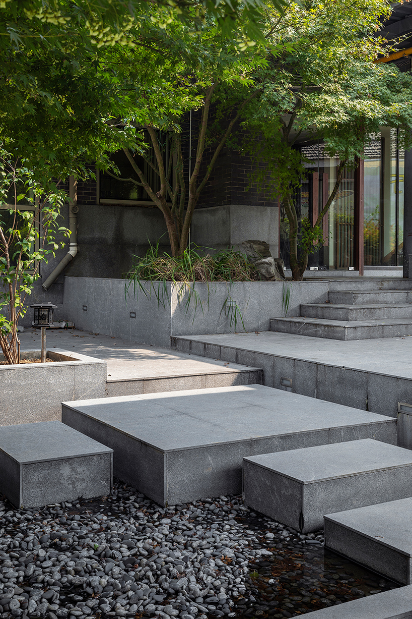 TEMP combines timber and granite to design ajia teahouse in a chinese national park designboom