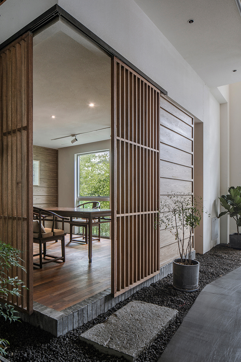TEMP combines timber and granite to design ajia teahouse in a chinese national park designboom