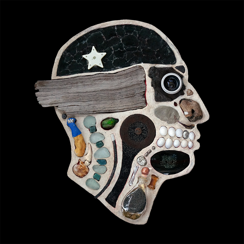 EMnXW's surrealist head sculptures are made of miscellaneous objects