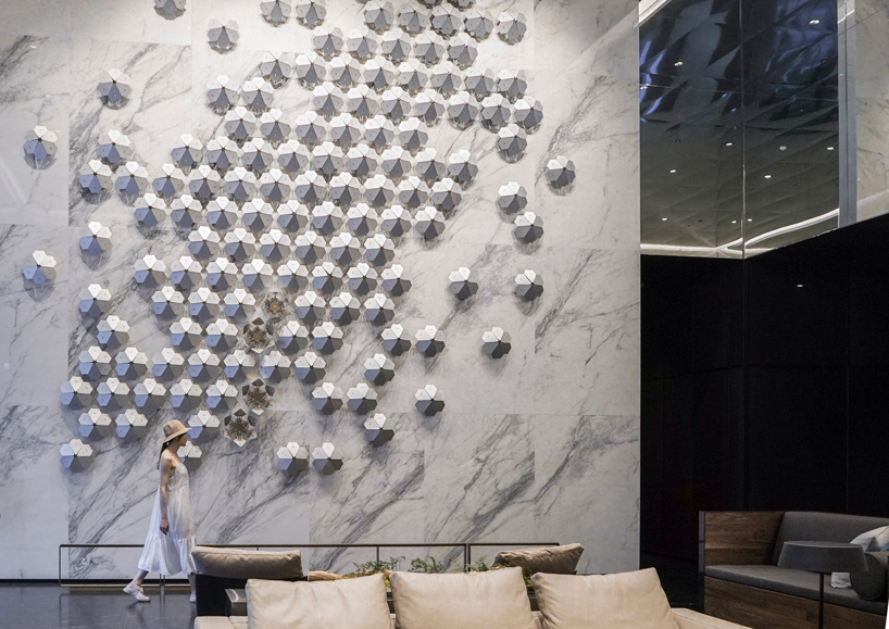 whyixd-heaven-bloom-metal-flowers-dynamic-lobby-taichung-city-taiwan-11-15-2019-designboom