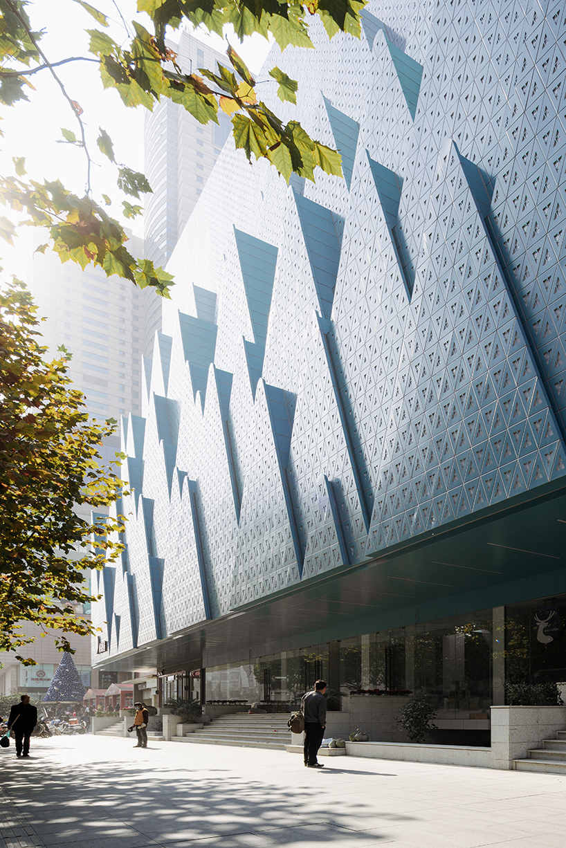 perforated aluminum plates clad wutopia lab's foreign language bookstore in china designboom