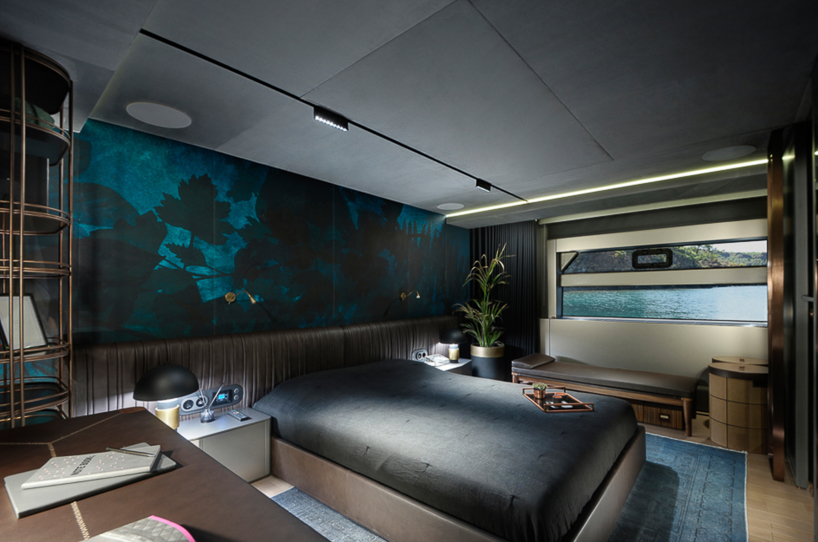 mazu's 82ft yacht combines an angular profile with cozy, home-like interiors designboom