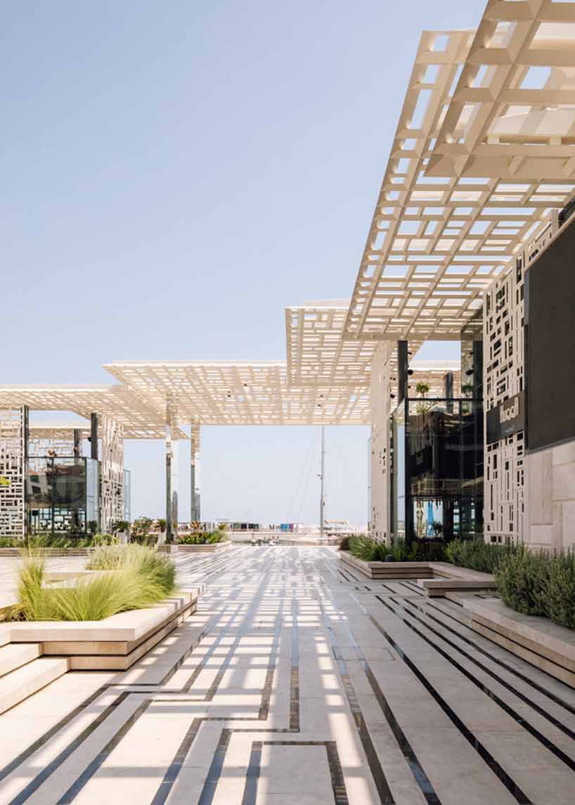 acme uses traditional geometries and local marble to build marsa plaza in muscat designboom
