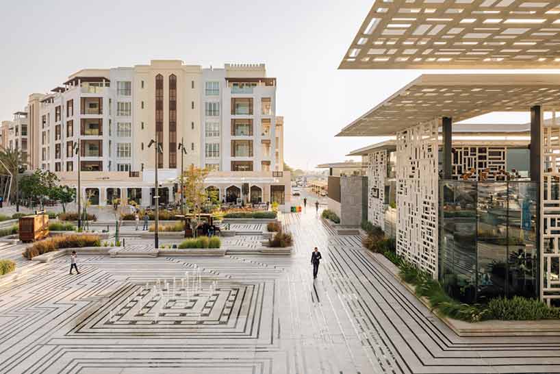 acme uses traditional geometries and local marble to build marsa plaza in muscat designboom