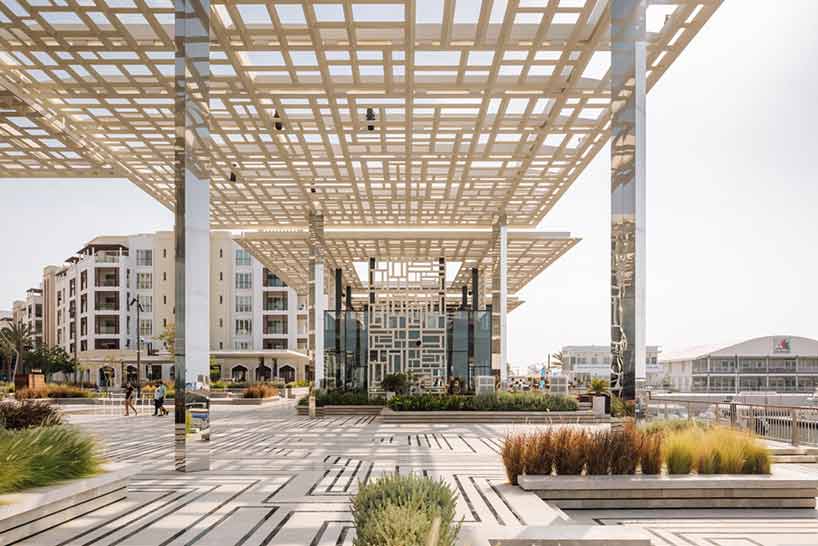 acme uses traditional geometries and local marble to build marsa plaza in muscat designboom