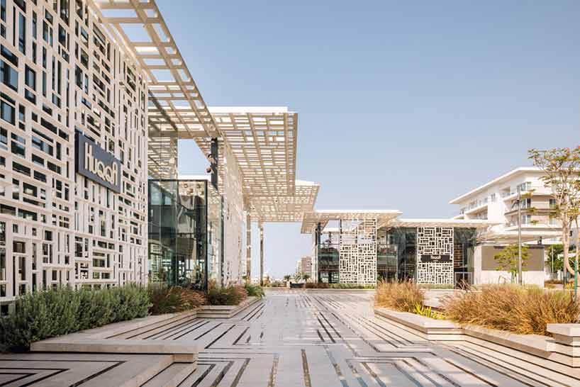 acme uses traditional geometries and local marble to build marsa plaza in muscat designboom
