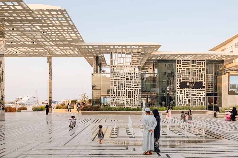 acme uses traditional geometries and local marble to build marsa plaza in muscat designboom