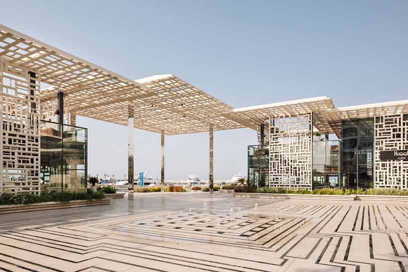 acme uses traditional geometries and local marble to build marsa plaza in muscat designboom
