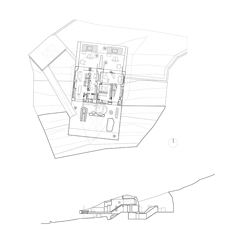 kapsimalis architects envisions two houses carved from rock in santorini designboom