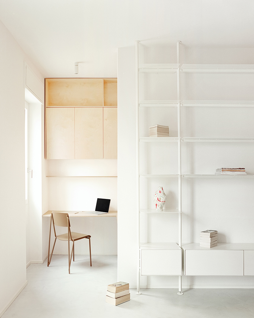 hybrid renovation by SET architects combines flexible living and working in milan