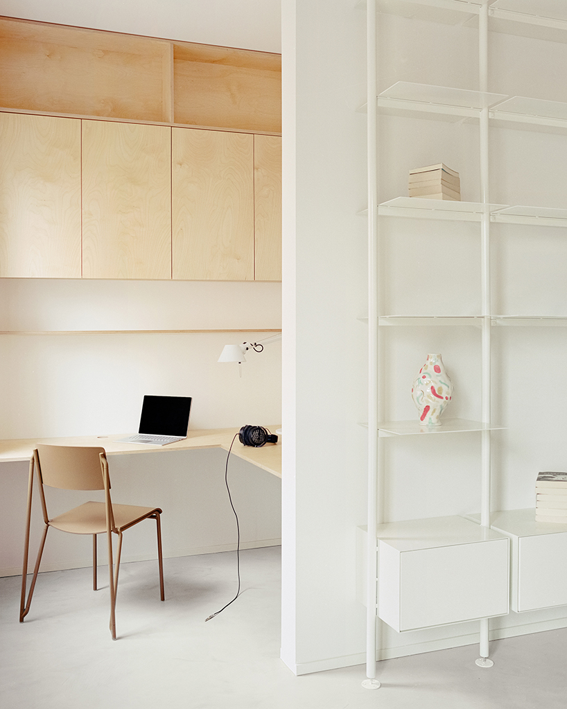 hybrid renovation by SET architects combines flexible living and working in milan