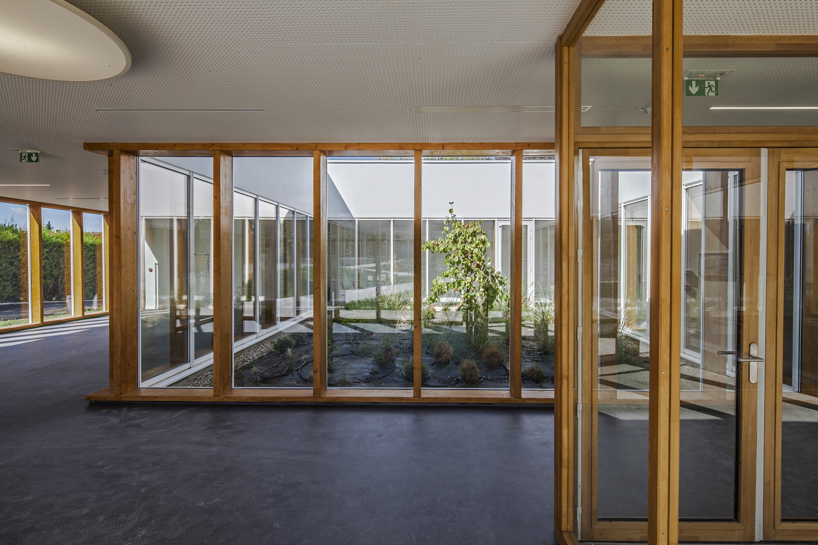 NZI architectes applies glazed façades to bring light into leisure center in france