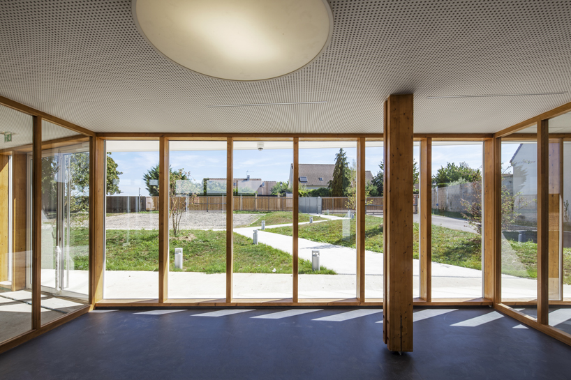 NZI architectes applies glazed façades to bring light into leisure center in france