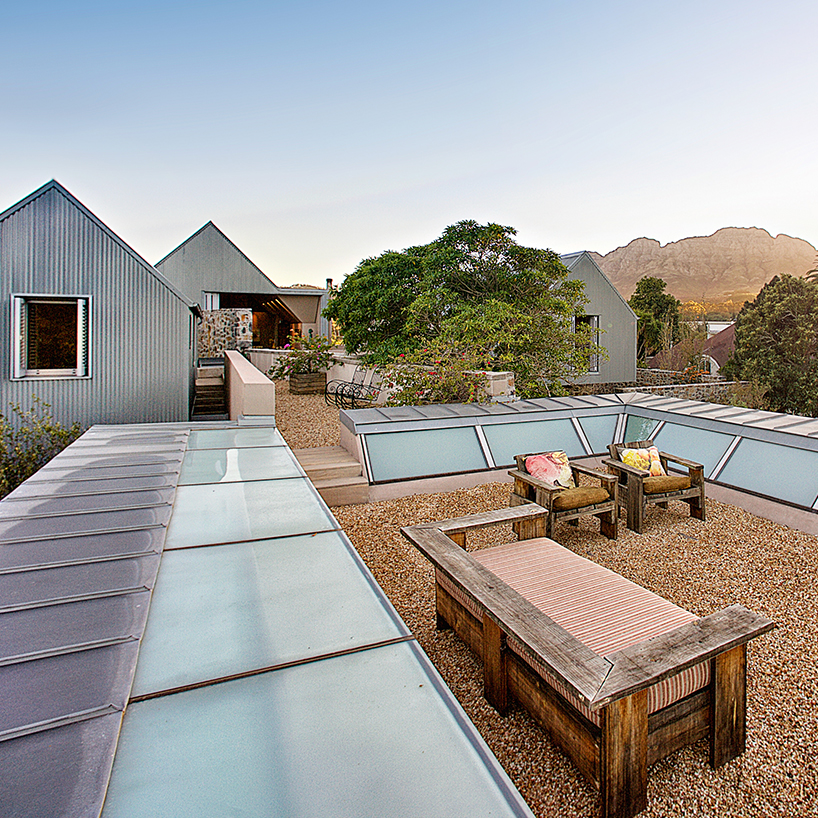 slee & co. architects' house is inspired by the local farm structures in south africa - 12